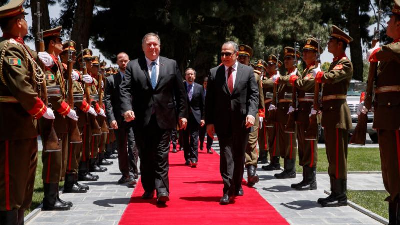 Secretary of State Mike Pompeo with Afghan President Ashraf Ghani's Chief of Staff, Abdul Salam Rahimi