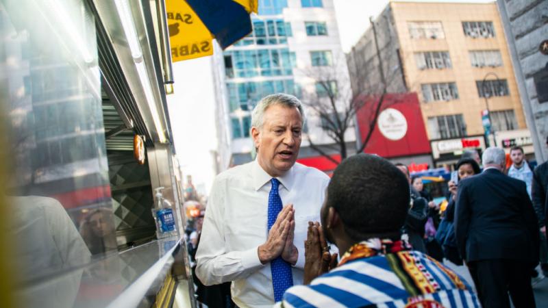 NYC Mayor Bill de Blasio distributes information about the Coronavirus in Union Square