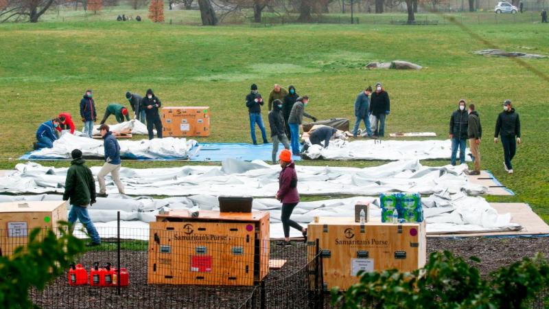 Volunteers set up emergency hospital beds in Central Park 