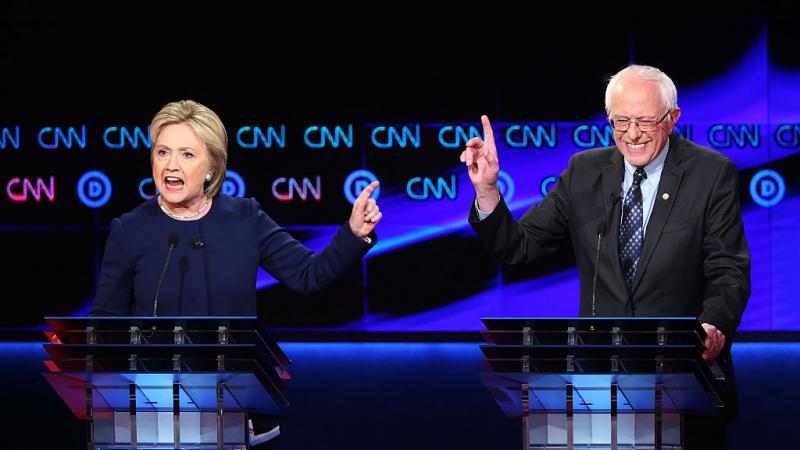 Hillary Clinton and Bernie Sanders at a CNN presidential debate in 2016