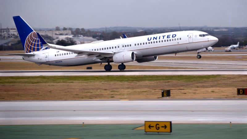 United Airlines flight departs