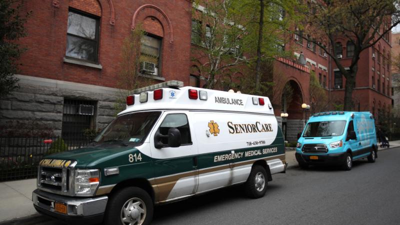 Ambulances outside of Cobble Hill Health Center on April 18, 2020
