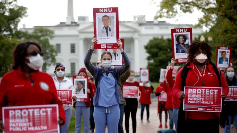 Nurses protest outside the White House for allocation of funds to mass produce PPE during the pandemic 