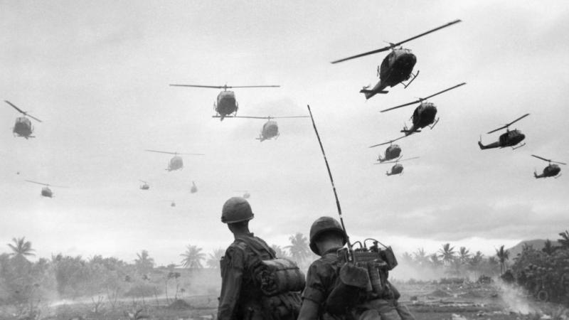 Helicopters of 1st Air Cavalry Division and two U.S. soldiers during Vietnam War