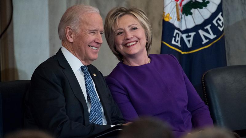Joe Biden and Hillary Clinton at a portrait unveiling for Harry Reid