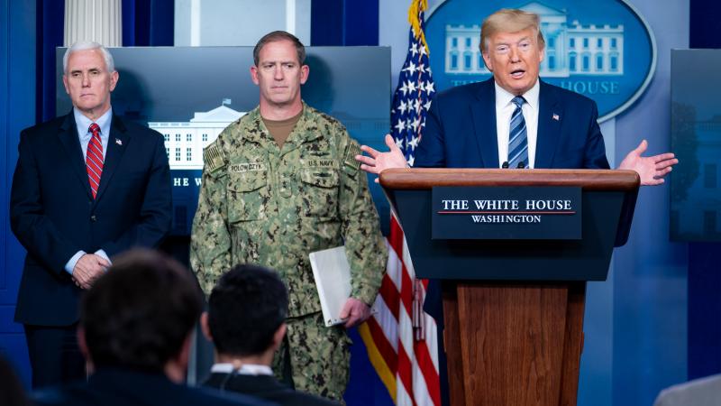 President Donald J. Trump, joined by Vice President Mike Pence and FEMA’s Supply Chain Task Force Lead Rear Adm. John Polowczyk, answers questions from reporters during a coronavirus update briefing Sunday, April 5, 2020