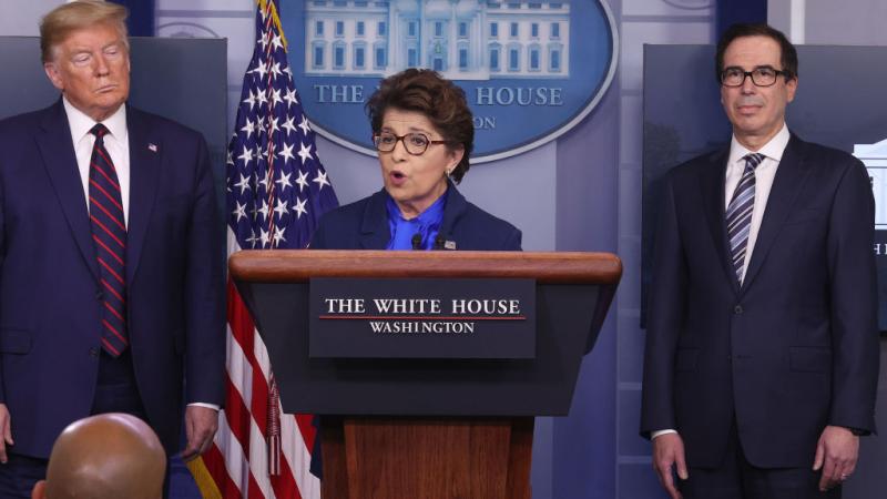 Small Business Administrator Jovita Carranza speaks alongside Steve Mnuchin and President Donald Trump