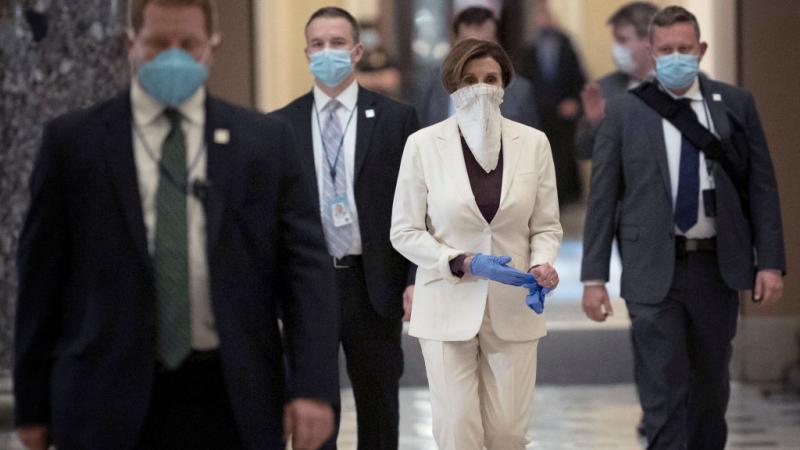 House Speaker Nancy Pelosi in protective gear at the Capitol