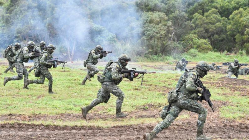 Taiwanese troops run a military drill