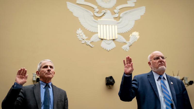 Redfield, Fauci sworn in