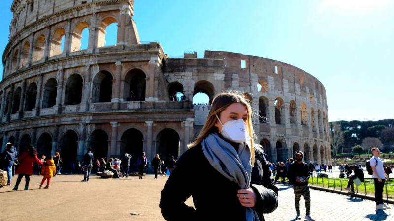 Person wearing mask in Rome, Italy in February 2020
