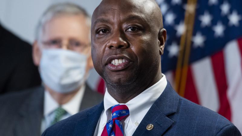 Sen. Tim Scott, R-S.C., right, and Senate Majority Leader Mitch McConnell, R-Ky.