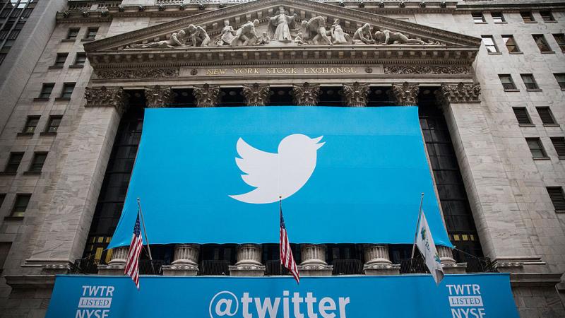 Twitter logo on banner outside NYSE in 2013