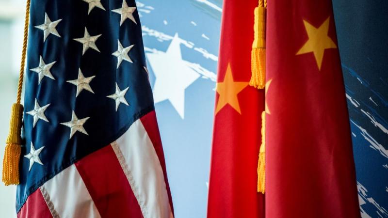 Chinese and American flags in Beijing in June 2017