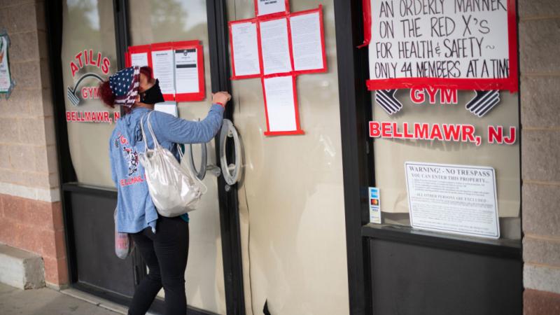 Woman outside of Atilis Gym on May 20, 2020 in Bellmawr, New Jersey