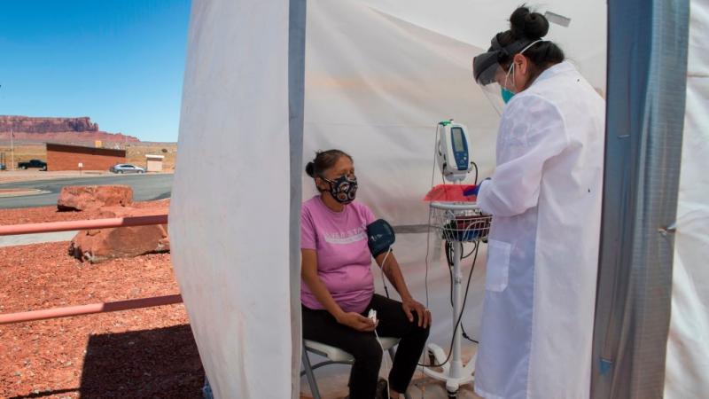 A Navajo Indian woman is tested for coronavirus, 5/21