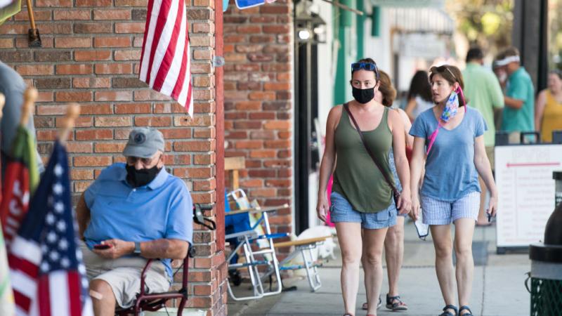 Passersby in St. Simons Island, Georgi