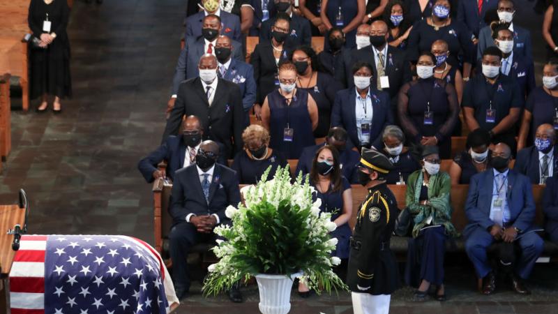 Attendees at Lewis's funeral on Thursday