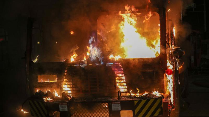 A vehicle set ablaze in Kenosha, Wisconsin, Aug. 24
