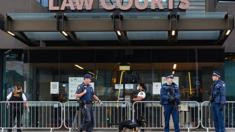 Officers and a police dog handler outside of Christchurch High Court before the sentencing of Brenton Tarrant on August 27, 2020