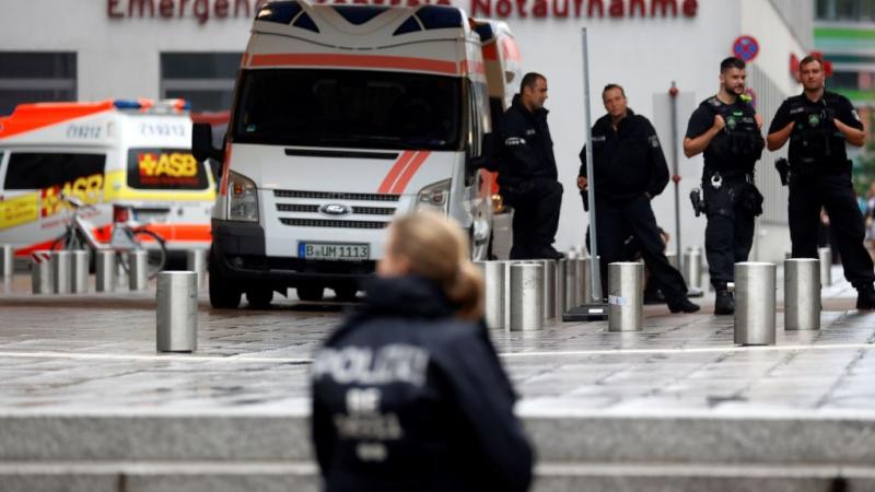 German police stand outside Charite hospital waiting for Navalny to arrive