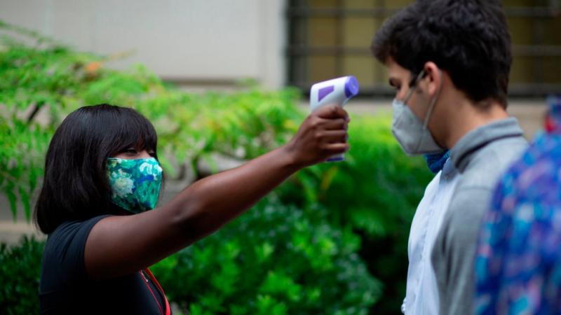 Temperature checks at the Metropolitan Museum of Art in New York, Aug. 29