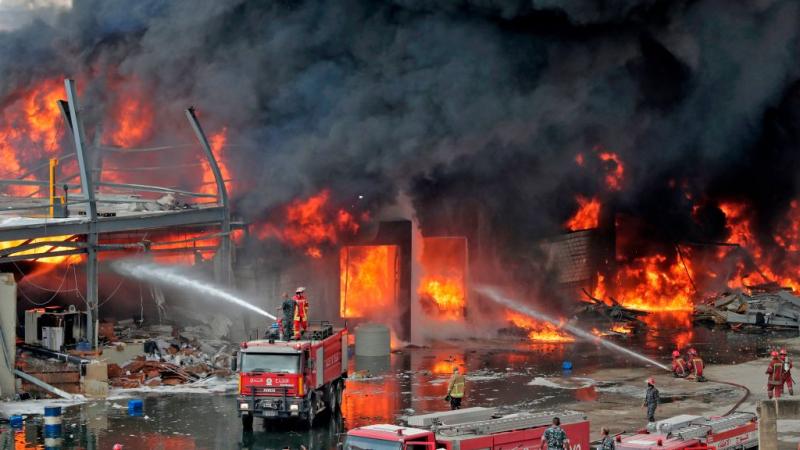 Lebanese firefighters work to put out Beirut port fire