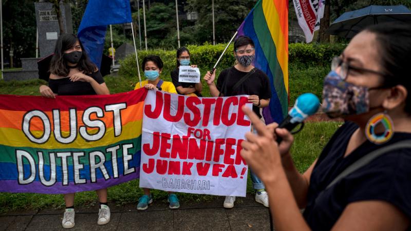 People protesting the pardon of U.S. Marine Joseph Scott Pemberton