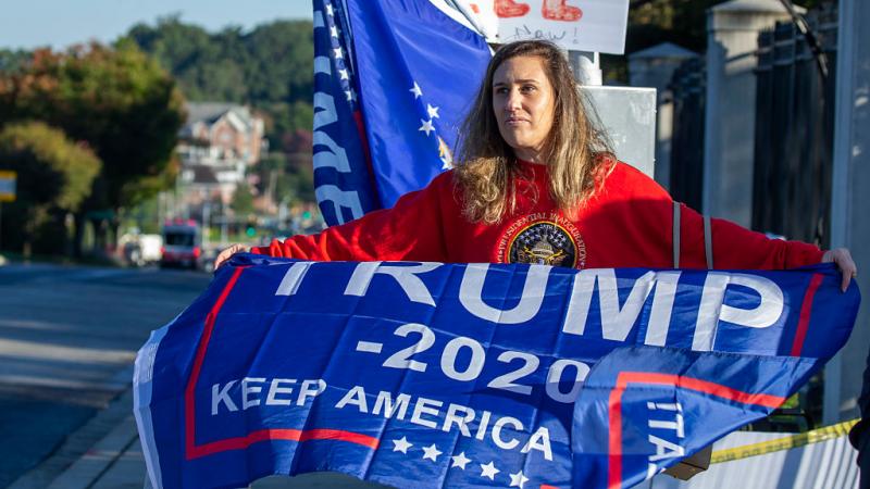 A Trump supporter outside of Walter Reed Medical Center, 10/5