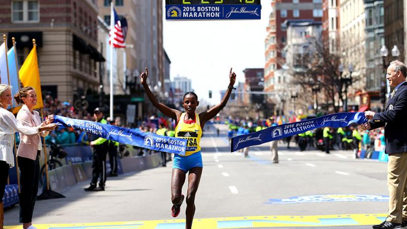 Atsede Baysa of Ethiopa crosses the finish line in 2016 Boston Marathon