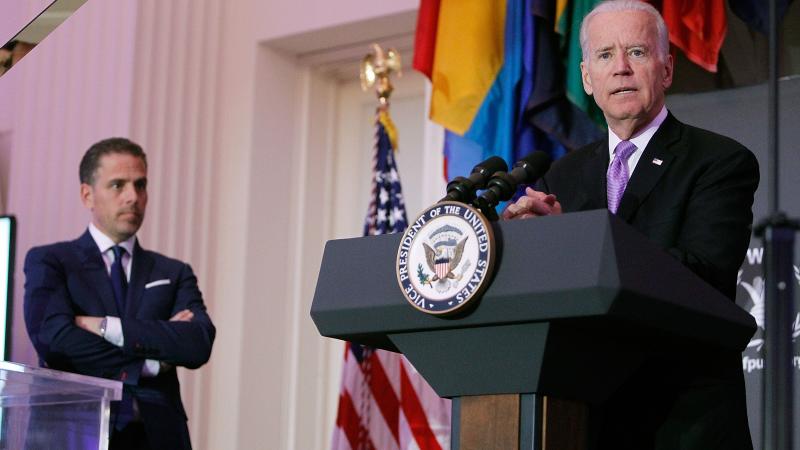 WASHINGTON, DC - APRIL 12: U.S. Vice President Joe Biden (R) speaks as his son, Hunter Biden, looks on at the World Food Program USA's Annual McGovern-Dole Leadership Award Ceremony at Organization of American States on April 12, 2016 in Washington, DC.