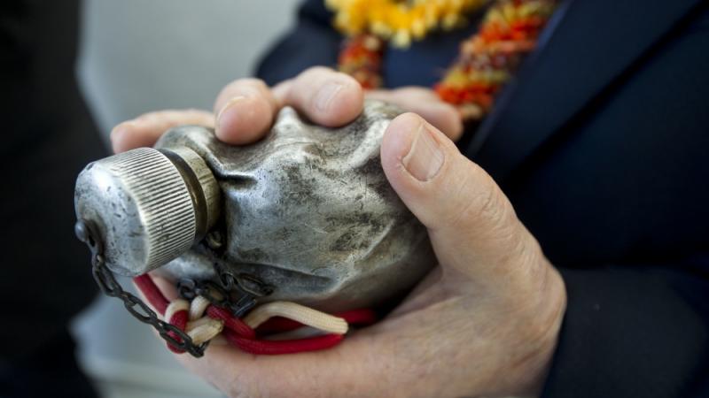 A WWII airman's crushed canteen has been part of Pearl Harbor commemorations