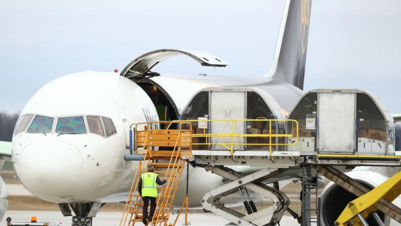 Shipments of the Pfizer-BioNTech COVID-19 vaccine getting loaded on Dec. 13, 2020