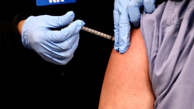 An injection of a COVID-19 vaccine