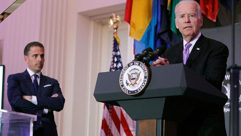 Joe Biden speaking with Hunter Biden watching in April 2016