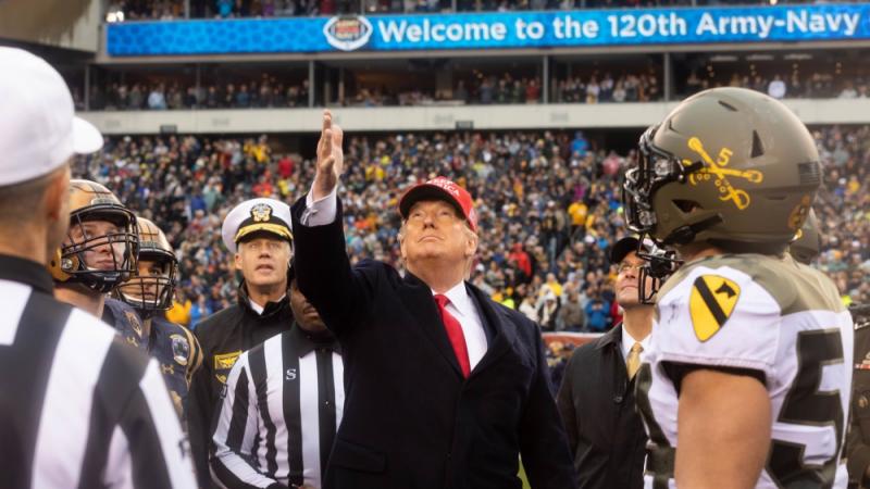 President Trump tosses the coin at the 2019 Army-Navy game.
