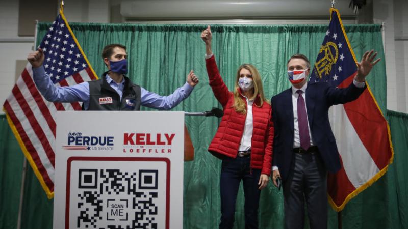 David Perdue and Kelly Loeffler with Sen. Tom Cotton, Nov. 19
