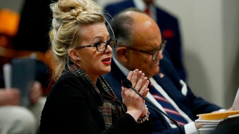 Melissa Carone, who was working for Dominion Voting Services, speaks in front of the Michigan House Oversight Committee in Lansing, Michigan on December 2, 2020