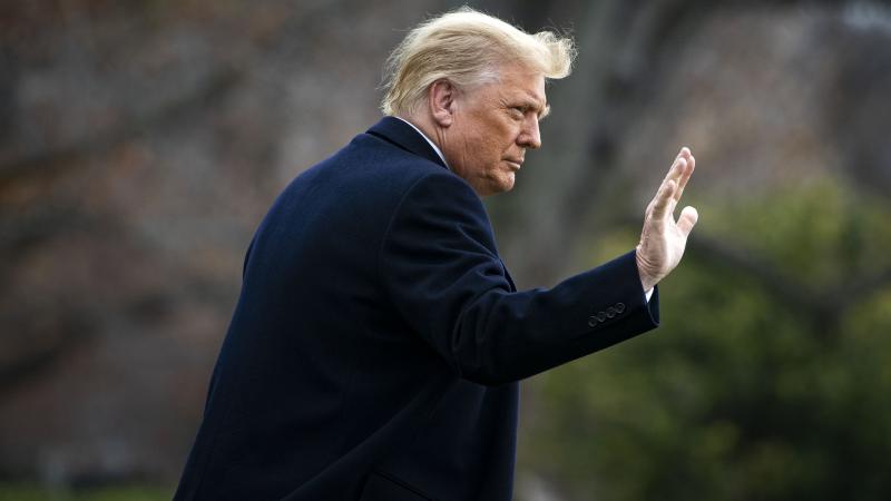U.S. President Donald Trump waves as he departs on the South Lawn of the White House, on December 12, 2020 in Washington, DC. Trump is traveling to the Army versus Navy Football Game at the United States Military Academy in West Point, NY.