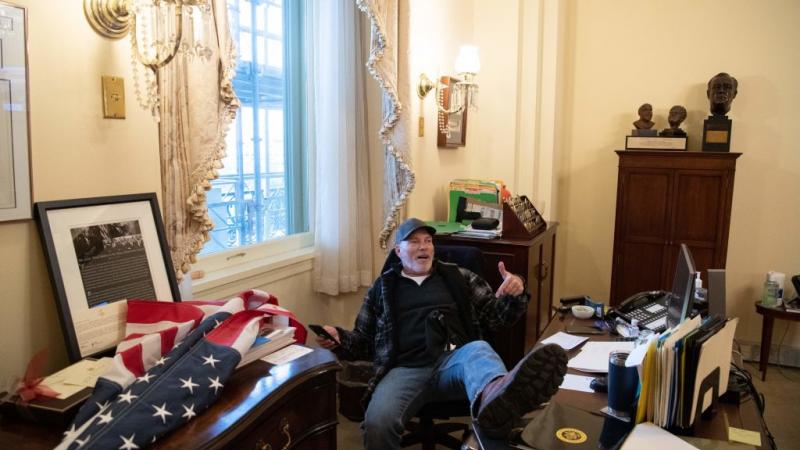 Richard Barnett in Nancy Pelosi's office, Jan. 6