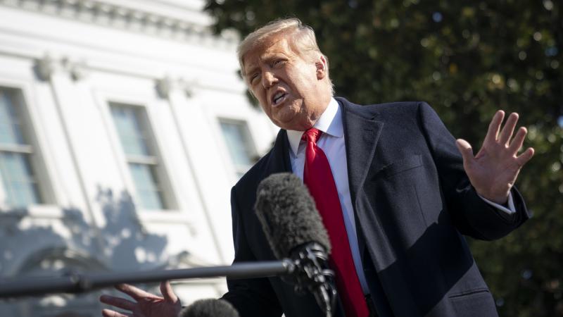 U.S. President Donald Trump speaks to reporters on the South Lawn of the White House before boarding Marine One on January 12, 2021 in Washington, DC.