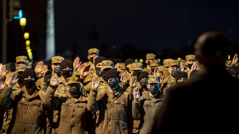 National Guard troops being deputized by the U.S. Marshals Service