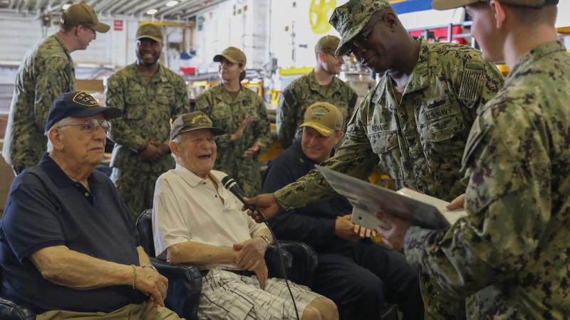 Battle of Bataan survivor Dan Crowley (center), April 2019