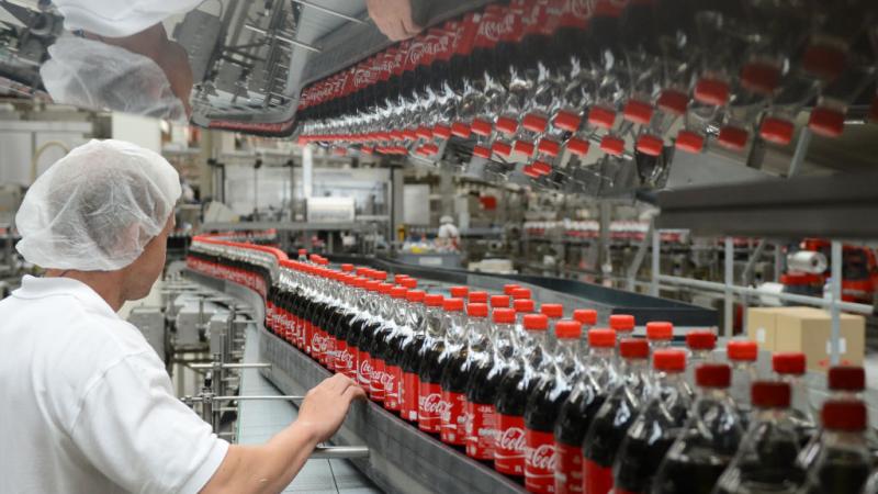Coca-Cola employee at Germany bottling plant. 