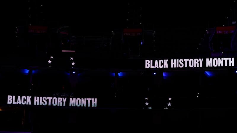 Signs referencing Black History Month at Wells Fargo Center on February 4, 2020