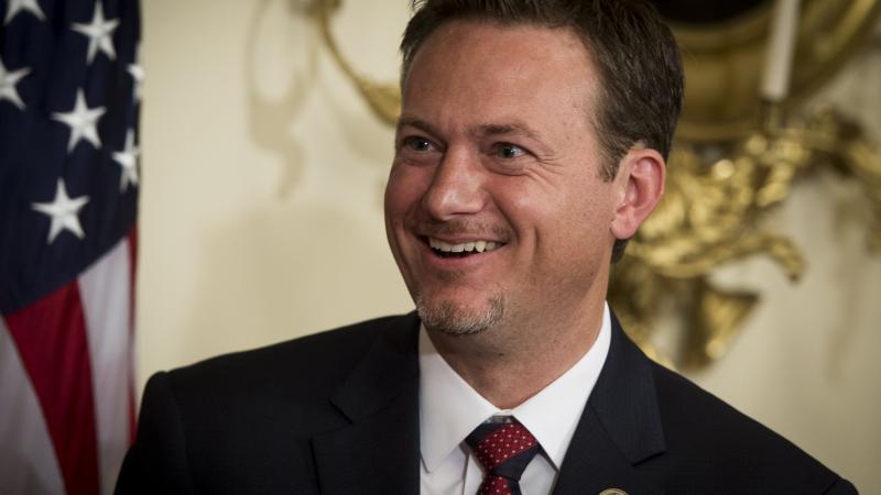 July 10: House Speaker Paul Ryan, R-Wis., swears In Rep.-elect Michael Cloud, R-Texas, in the Capitol on Tuesday, July 10, 2018.