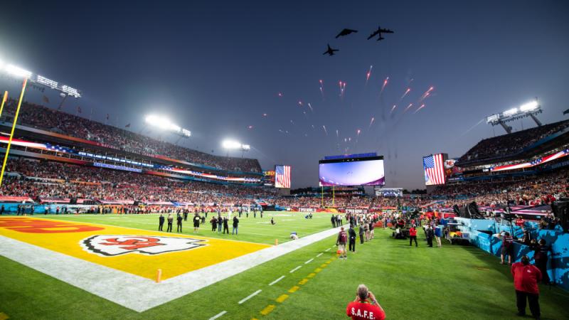 A B-52, a B-1, and a B-2 in formation over Super Bowl LV