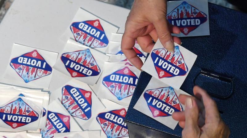 Voter receives a sticker after voting in Henderson, Nevada in 2018