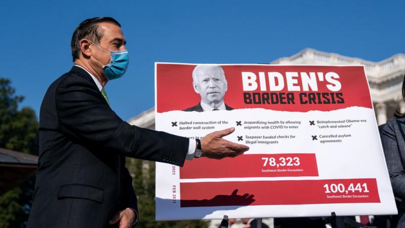 Rep. Darrell Issa (R-CA) gestures before the start of a press conference about the situation at the United States southern border