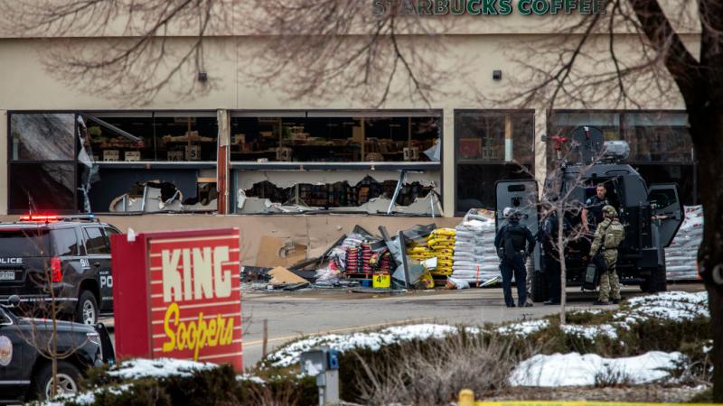 Tactical police units respond to the scene of a supermarket after shooting on March 22, 2021 in Boulder, Colorado